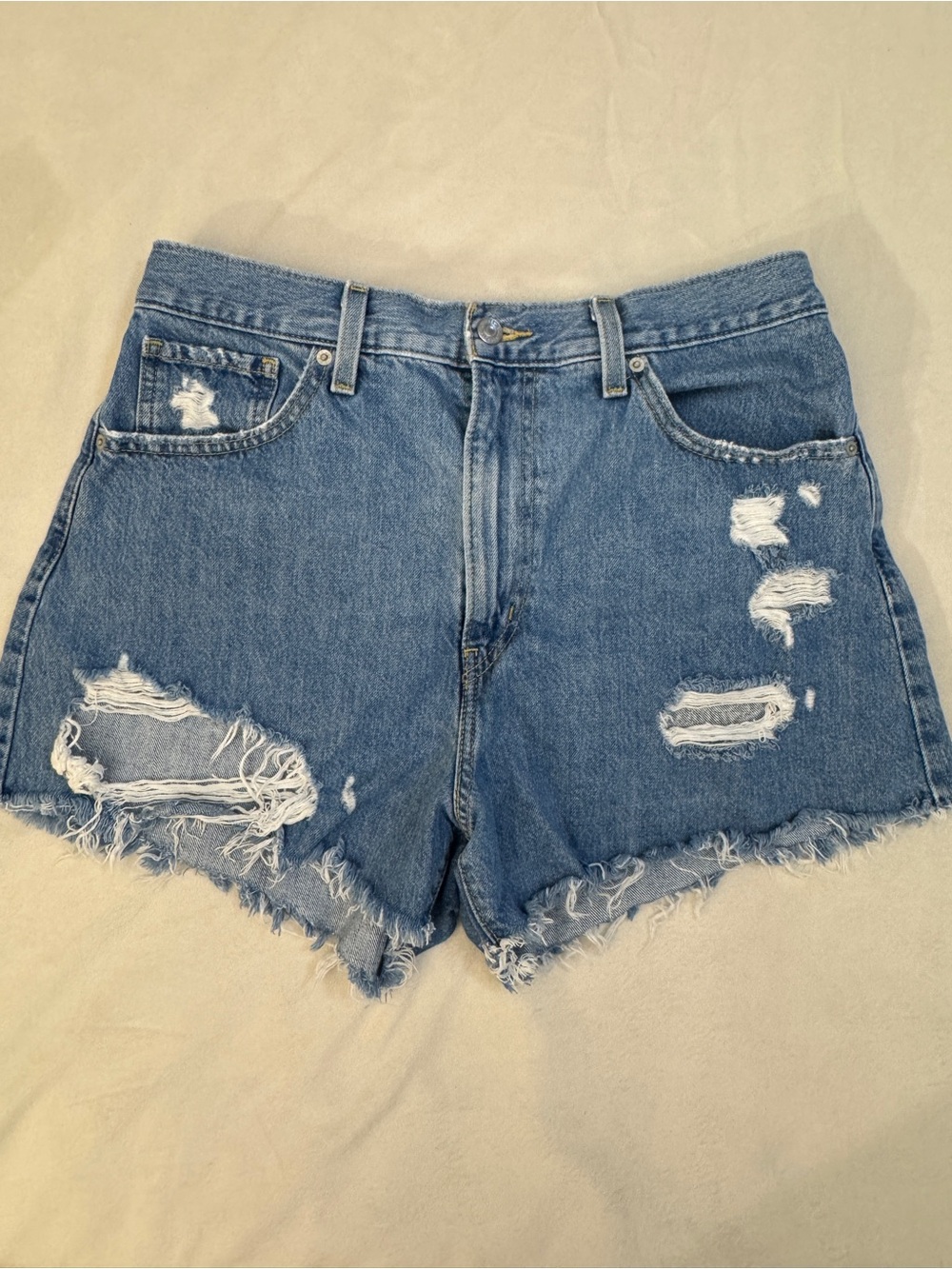 Levi’s High-Rise Distressed Denim Mom Shorts